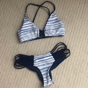 Beach babe swimwear. Medium bottom, small top.